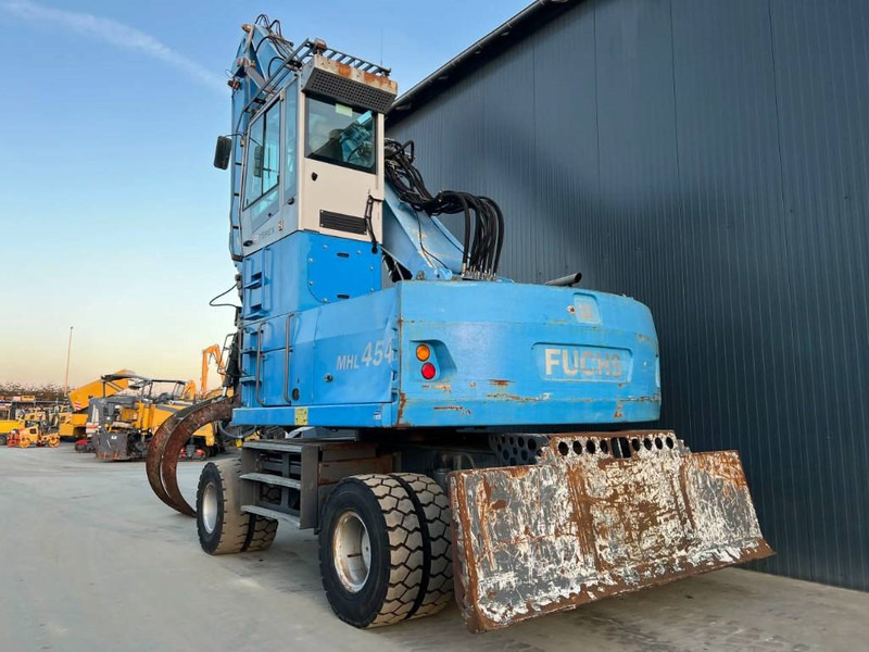 Fuchs MHL454 - Atkritumu iekrāvējs: foto 2 Fuchs MHL454 - Atkritumu iekrāvējs: foto 2