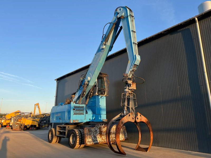 Fuchs MHL454 - Atkritumu iekrāvējs: foto 3 Fuchs MHL454 - Atkritumu iekrāvējs: foto 3