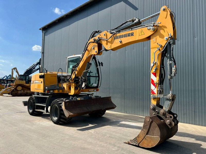 Liebherr A311 Litronic - Riteņu ekskavators: foto 3 Liebherr A311 Litronic - Riteņu ekskavators: foto 3