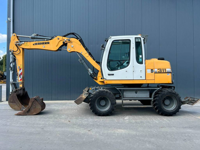 Liebherr A311 Litronic - Riteņu ekskavators: foto 5 Liebherr A311 Litronic - Riteņu ekskavators: foto 5