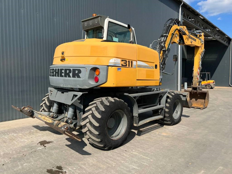 Liebherr A311 Litronic - Riteņu ekskavators: foto 4 Liebherr A311 Litronic - Riteņu ekskavators: foto 4