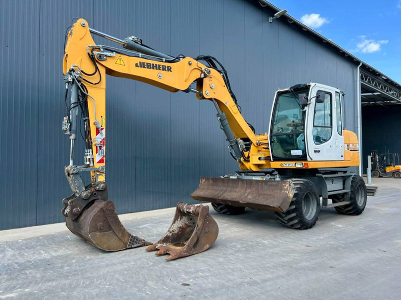 Liebherr A311 Litronic - Riteņu ekskavators: foto 1 Liebherr A311 Litronic - Riteņu ekskavators: foto 1