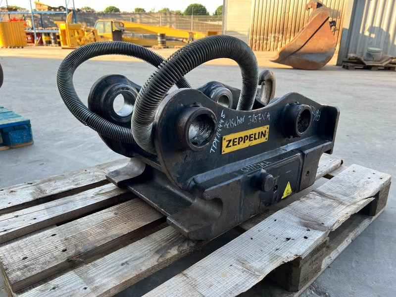 OilQuick OQ65 - 311F / 313F / 315F - Ātrā sakabe - Celtniecības tehnika: foto 4 OilQuick OQ65 - 311F / 313F / 315F - Ātrā sakabe - Celtniecības tehnika: foto 4