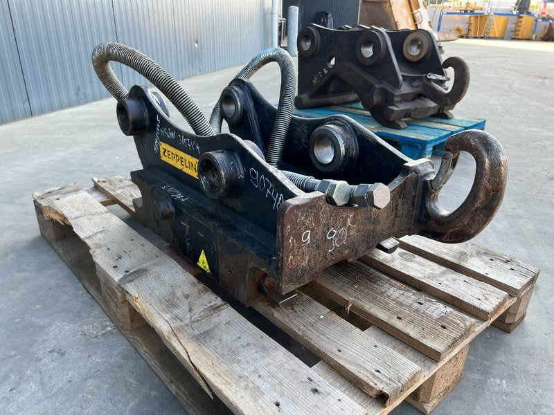 OilQuick OQ65 - 311F / 313F / 315F - Ātrā sakabe - Celtniecības tehnika: foto 3 OilQuick OQ65 - 311F / 313F / 315F - Ātrā sakabe - Celtniecības tehnika: foto 3