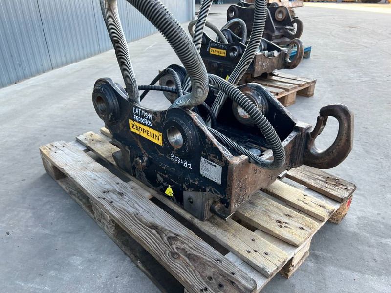 OilQuick OQ65 - M314F / M316F / M318F - Ātrā sakabe - Celtniecības tehnika: foto 3 OilQuick OQ65 - M314F / M316F / M318F - Ātrā sakabe - Celtniecības tehnika: foto 3