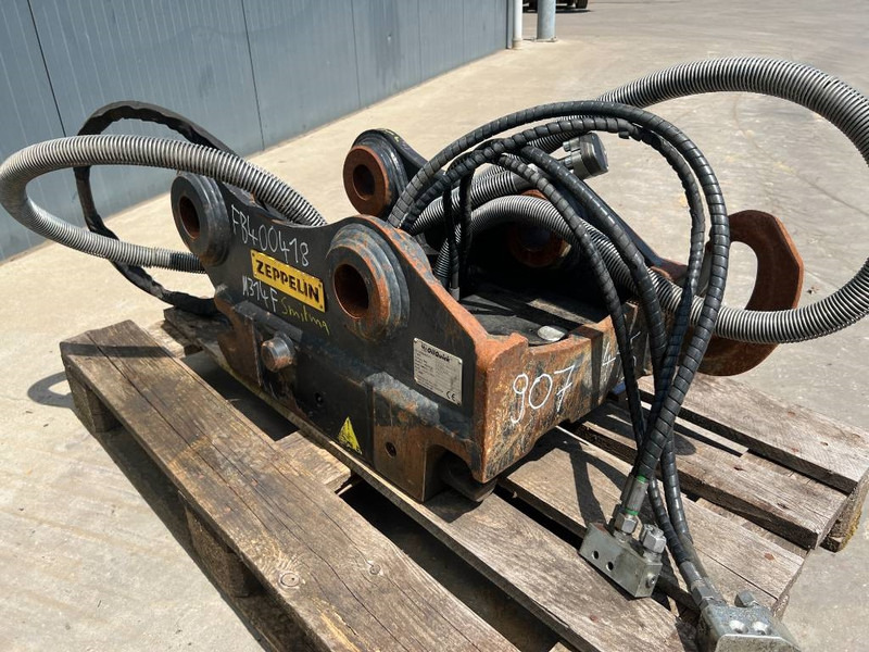 OilQuick OQ65 - M314F / M316F / M318F - Ātrā sakabe - Celtniecības tehnika: foto 3 OilQuick OQ65 - M314F / M316F / M318F - Ātrā sakabe - Celtniecības tehnika: foto 3