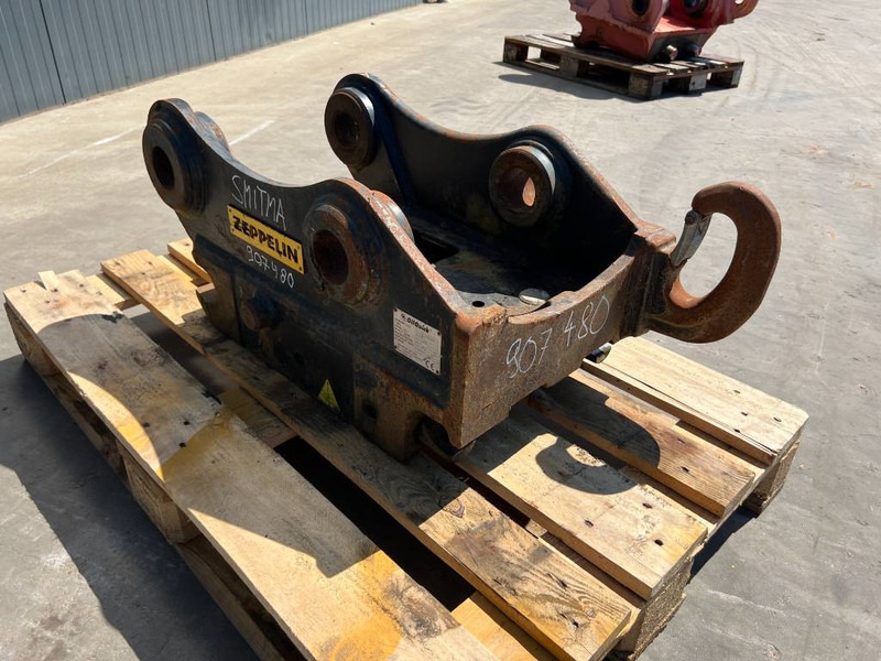 OilQuick OQ65 - M314F / M316F / M318F - Ātrā sakabe - Celtniecības tehnika: foto 3 OilQuick OQ65 - M314F / M316F / M318F - Ātrā sakabe - Celtniecības tehnika: foto 3