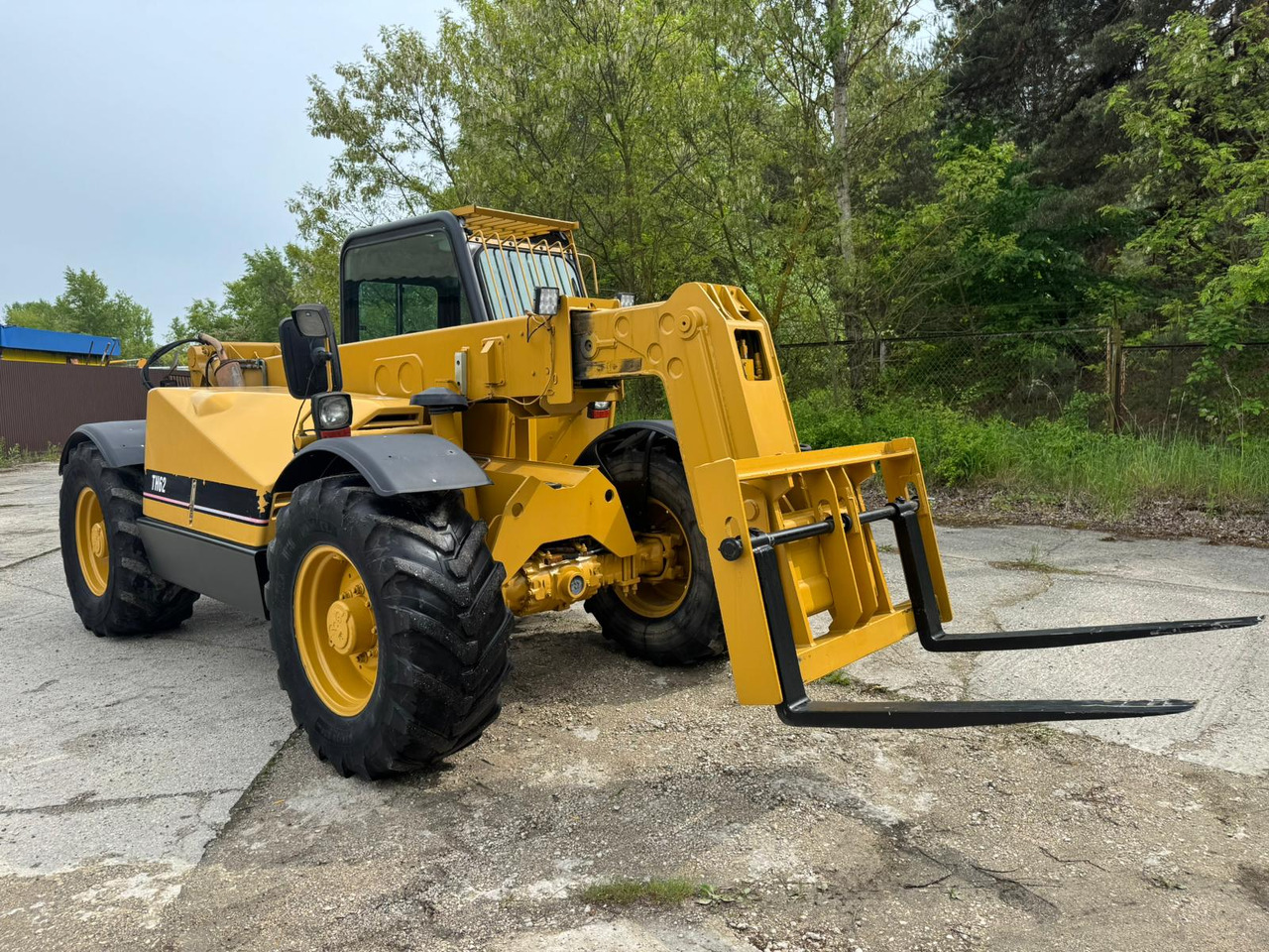 CATERPILLAR CAT TH 62 - Riteņu iekrāvējs: foto 2 CATERPILLAR CAT TH 62 - Riteņu iekrāvējs: foto 2