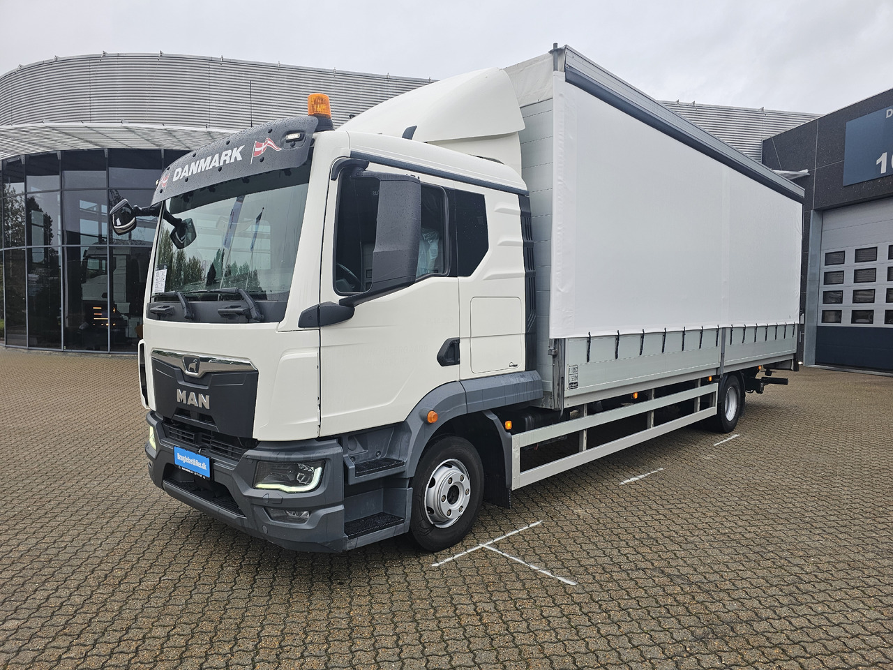 MAN TGL 12.250 - Kravas automašīna ar tentu: foto 1 MAN TGL 12.250 - Kravas automašīna ar tentu: foto 1