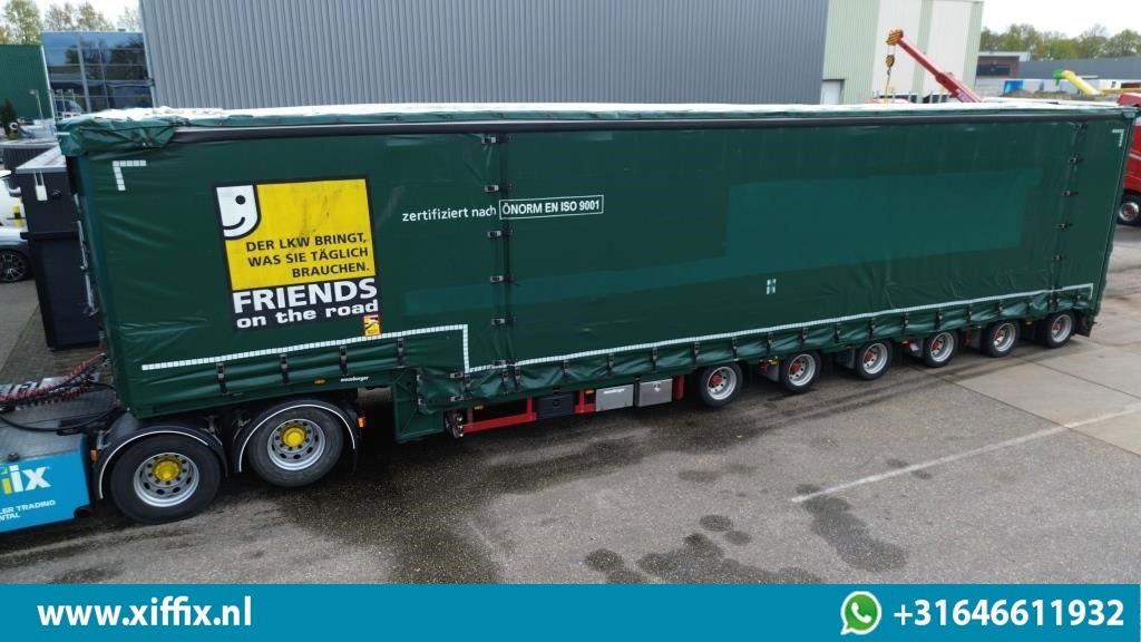 Meusburger 6-ass. Semi dieplader met elektrische huifopbouw / 3x naloop gestuurd - Puspiekabe zema profila platforma: foto 1 Meusburger 6-ass. Semi dieplader met elektrische huifopbouw / 3x naloop gestuurd - Puspiekabe zema profila platforma: foto 1