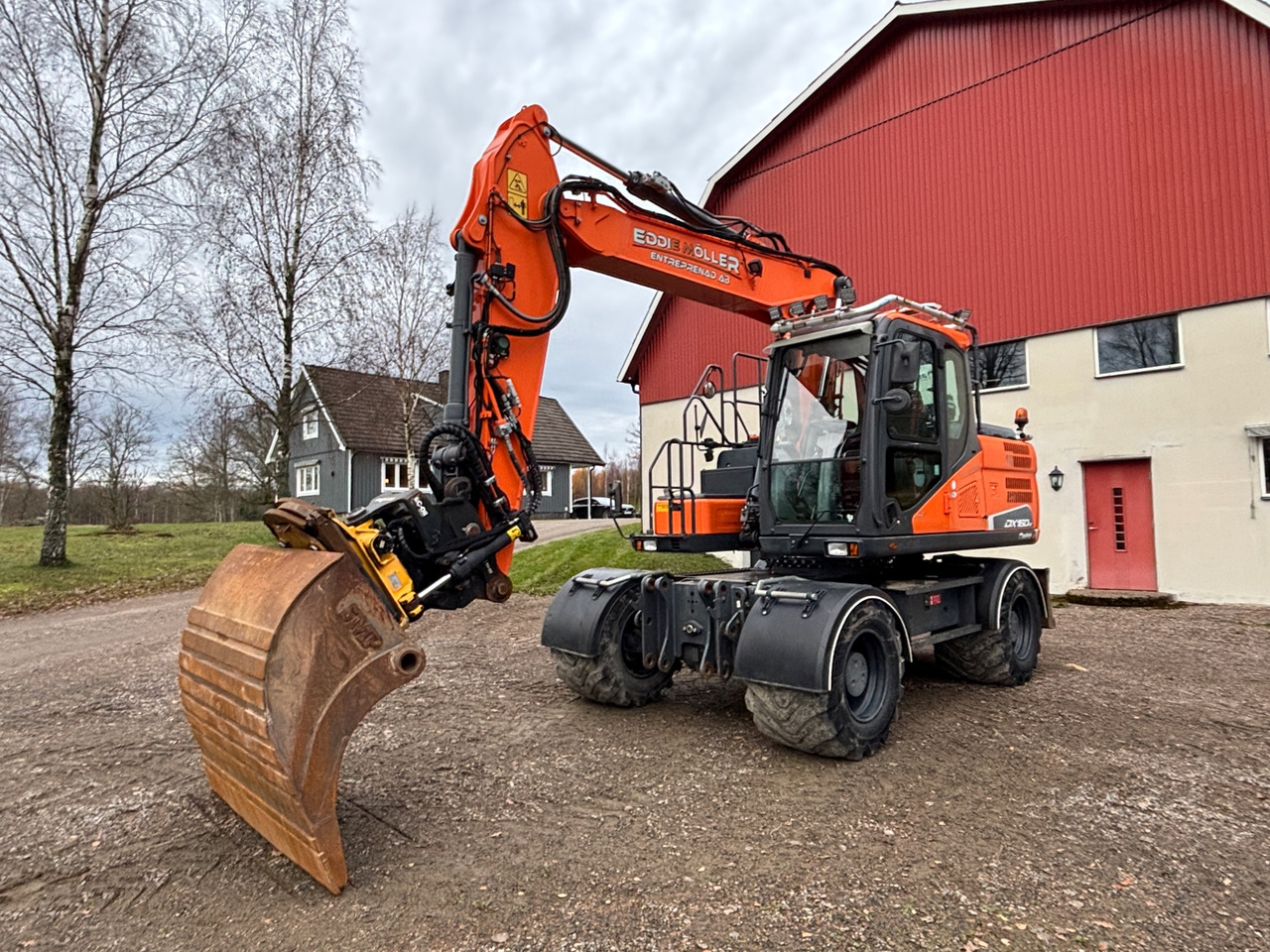 Doosan DX160W-5 - Ekskavators: foto 1 Doosan DX160W-5 - Ekskavators: foto 1