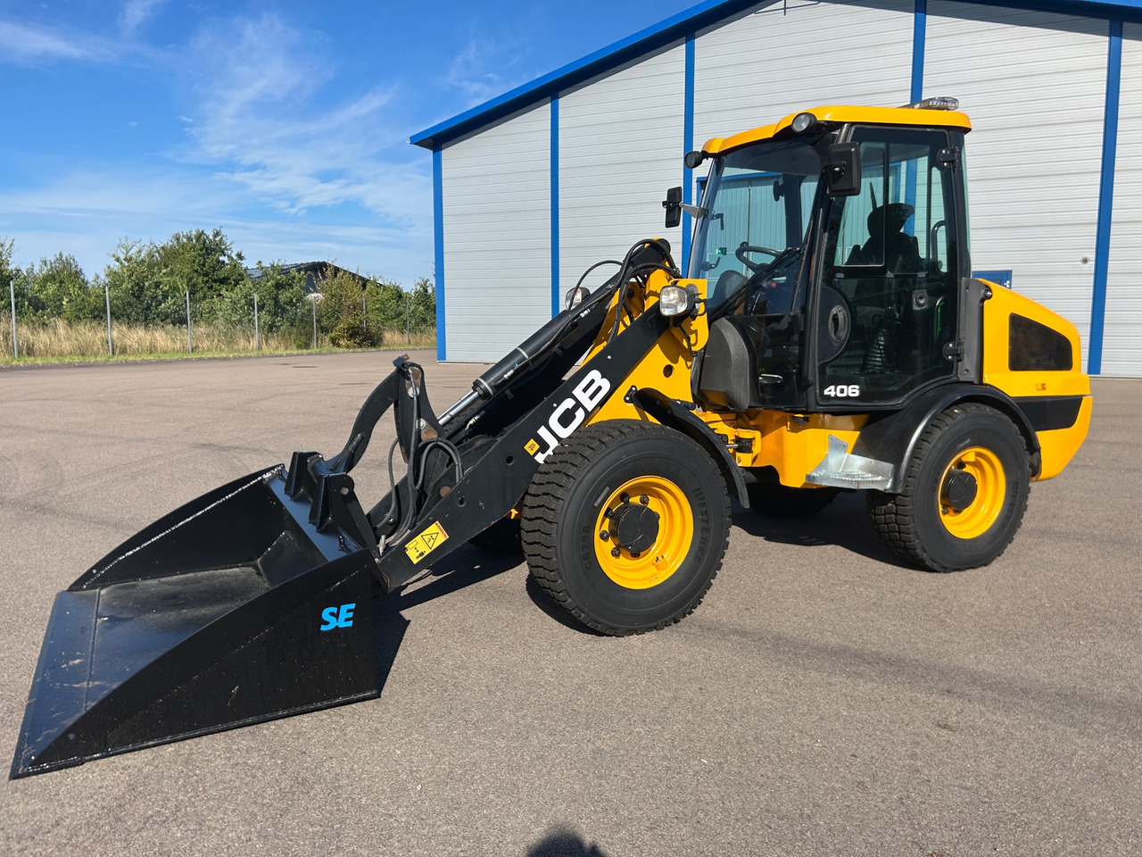 JCB 406 - Riteņu iekrāvējs: foto 1 JCB 406 - Riteņu iekrāvējs: foto 1
