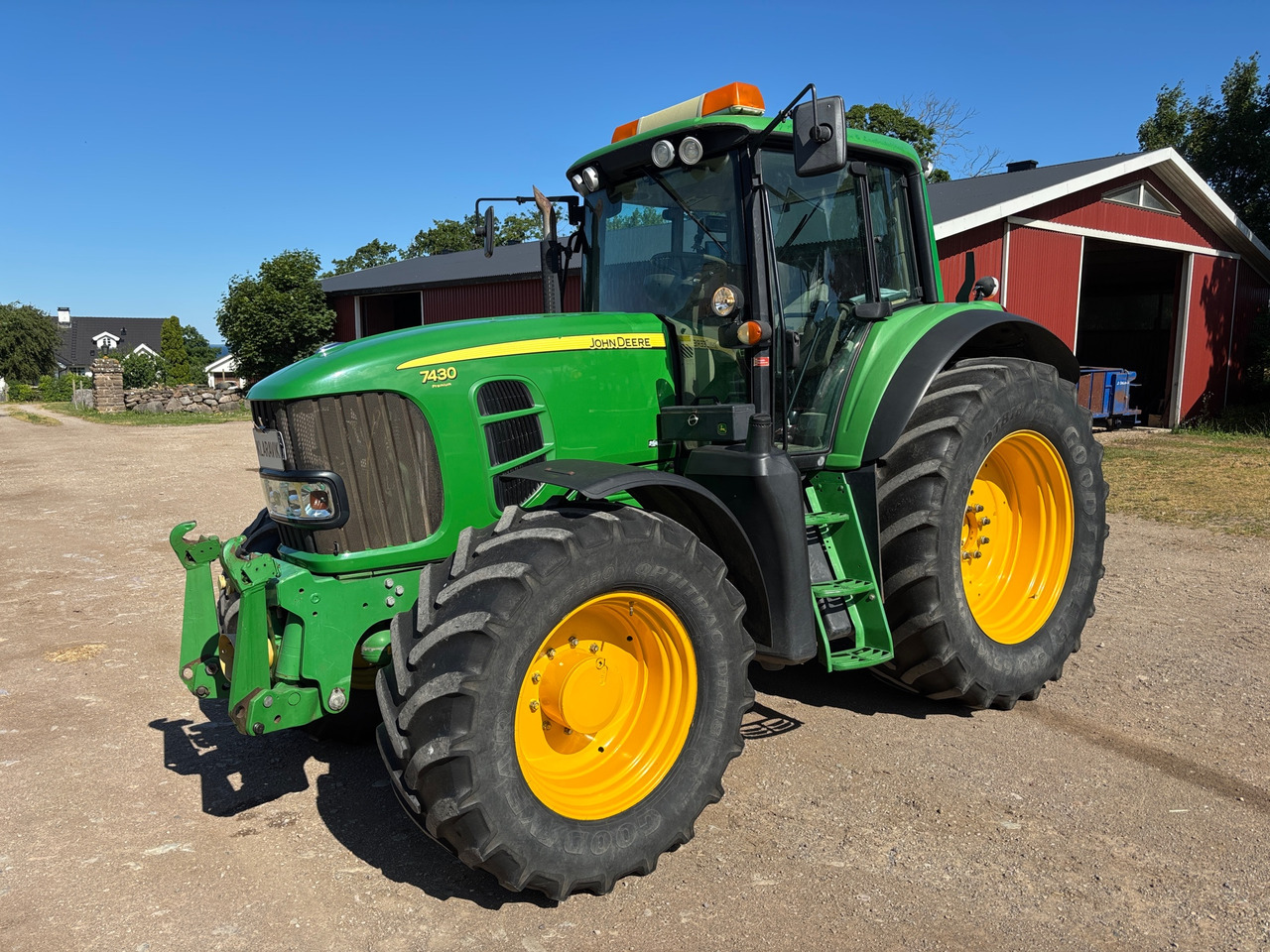 John Deere 7430 Premium - Traktors: foto 1 John Deere 7430 Premium - Traktors: foto 1