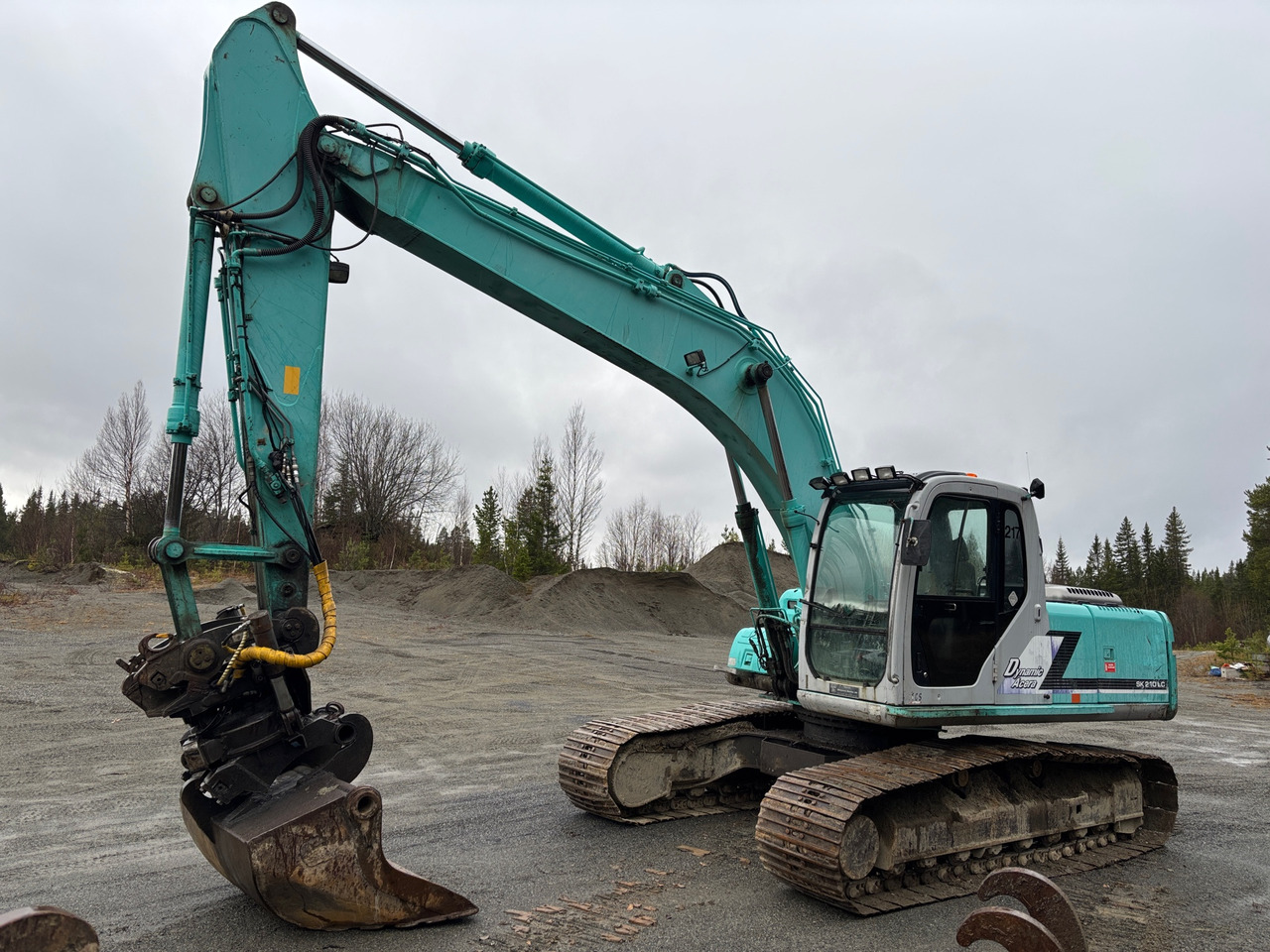 Kobelco SK 210 LC - 6 - Ekskavators: foto 1 Kobelco SK 210 LC - 6 - Ekskavators: foto 1