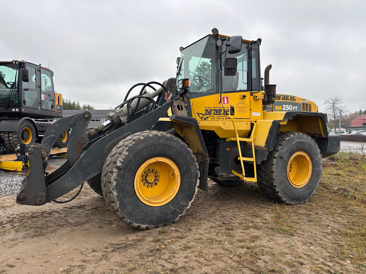 Komatsu WA250PT-5H - Riteņu iekrāvējs: foto 1 Komatsu WA250PT-5H - Riteņu iekrāvējs: foto 1