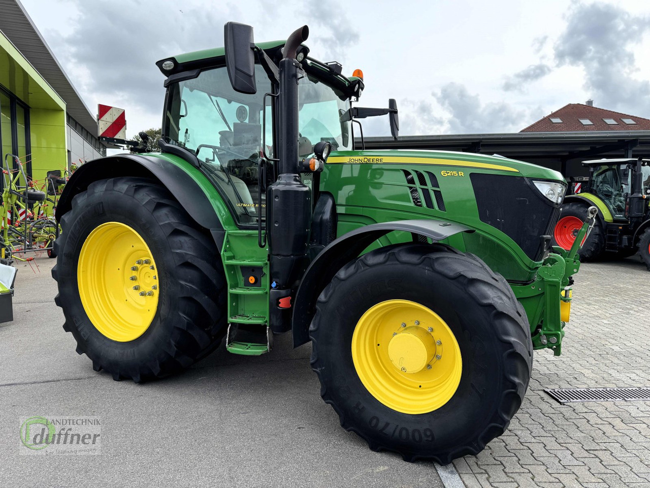 John Deere 6215R - Traktors: foto 2 John Deere 6215R - Traktors: foto 2