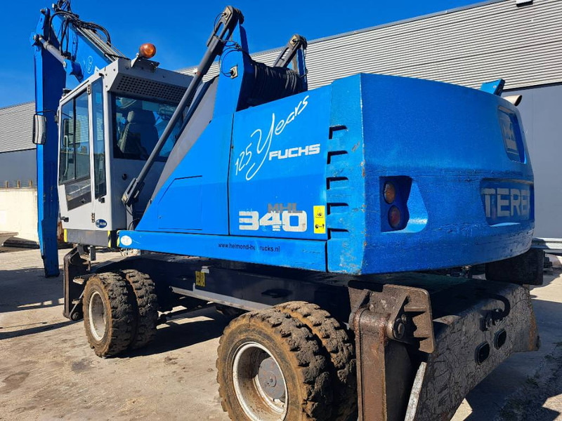 Fuchs MHL 340 D - Atkritumu iekrāvējs: foto 1 Fuchs MHL 340 D - Atkritumu iekrāvējs: foto 1