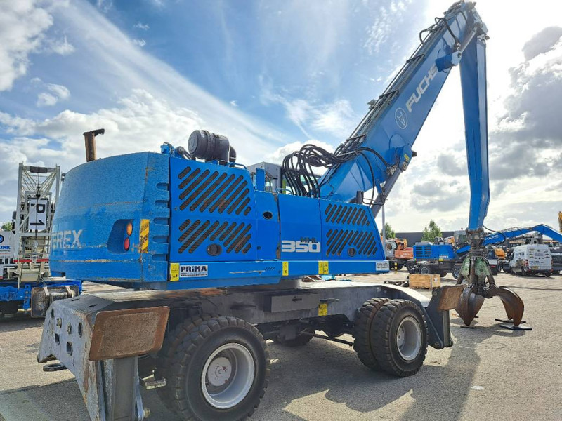 Fuchs MHL 350 E - Atkritumu iekrāvējs: foto 4 Fuchs MHL 350 E - Atkritumu iekrāvējs: foto 4