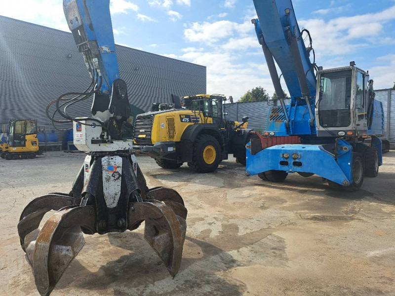 Fuchs MHL 360 D - Atkritumu iekrāvējs: foto 1 Fuchs MHL 360 D - Atkritumu iekrāvējs: foto 1