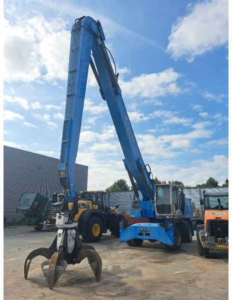 Fuchs MHL 360 D - Atkritumu iekrāvējs: foto 2 Fuchs MHL 360 D - Atkritumu iekrāvējs: foto 2