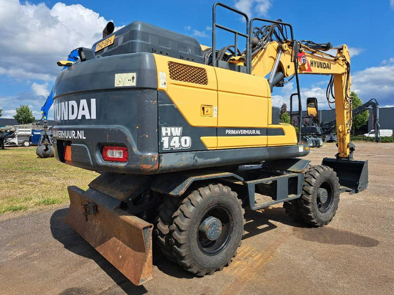 Hyundai HW140 - Riteņu ekskavators: foto 3 Hyundai HW140 - Riteņu ekskavators: foto 3