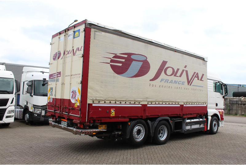 MAN TGX 26.440 * EURO5 * 6X2 * LIFT AXLE * - Kravas automašīna ar tentu: foto 4 MAN TGX 26.440 * EURO5 * 6X2 * LIFT AXLE * - Kravas automašīna ar tentu: foto 4