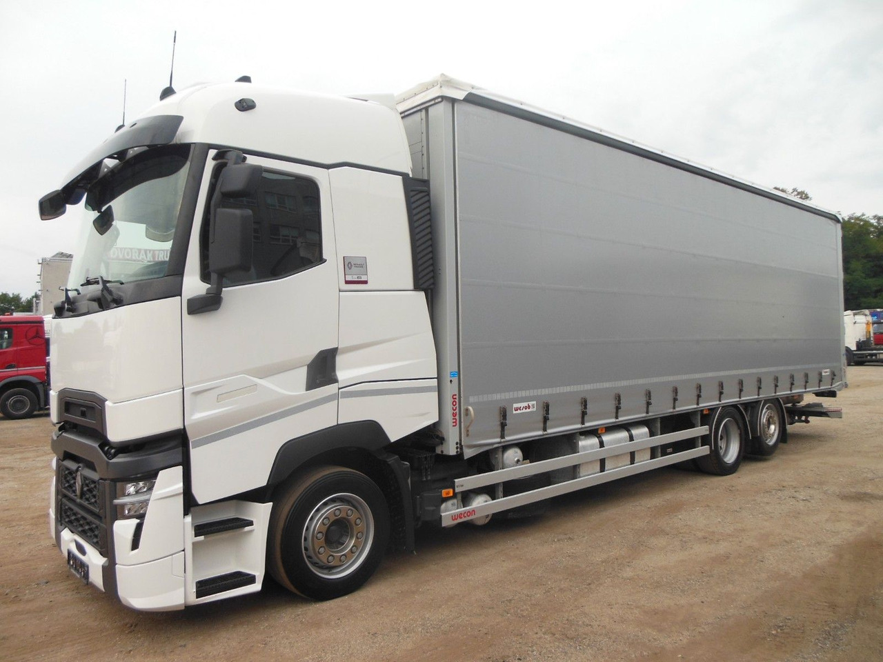 Renault T 440, 6X2, D-HOLLANDIA, 23 PALETTEN, WIE NEUE! - Kravas automašīna ar tentu: foto 1 Renault T 440, 6X2, D-HOLLANDIA, 23 PALETTEN, WIE NEUE! - Kravas automašīna ar tentu: foto 1