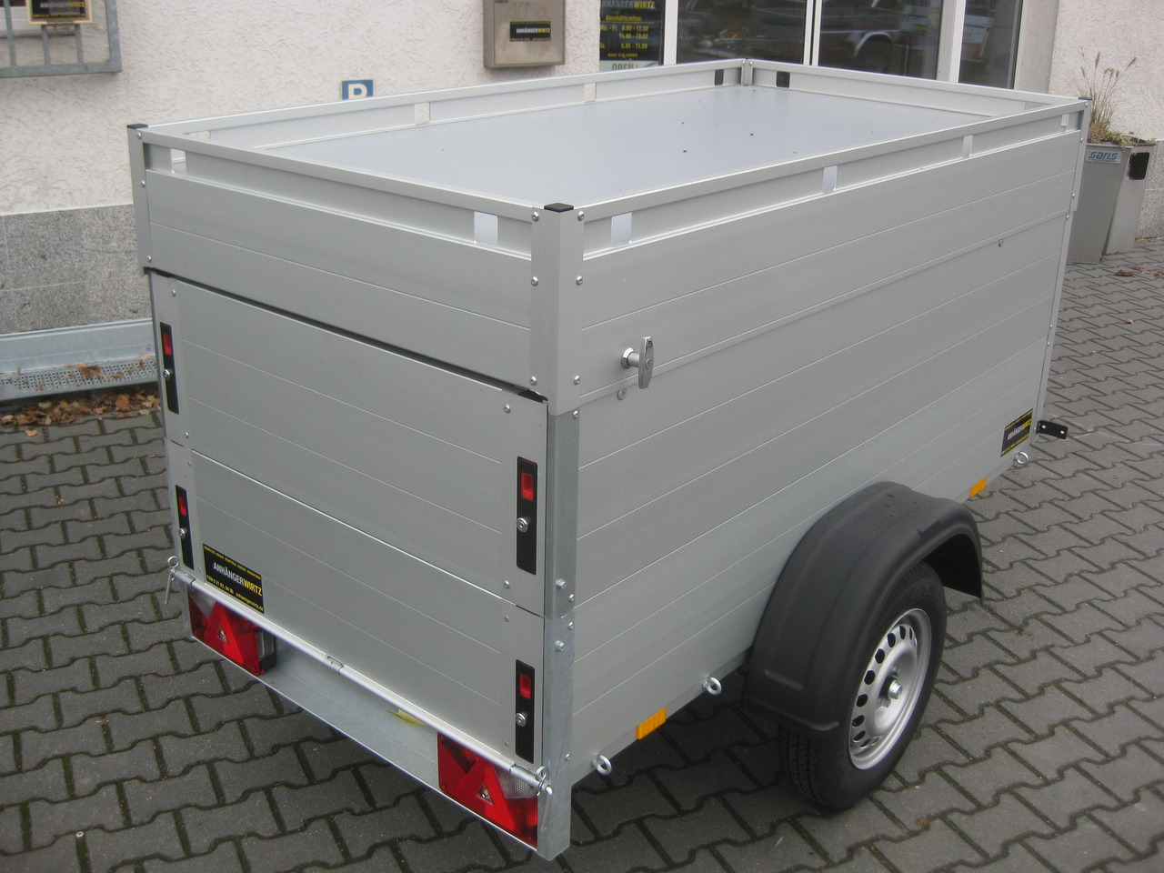 ALUBOXX Deckelanhänger GT 750 VT1 201x101x83cm (XS) 750kg - Piekabe slēgtā virsbūve: foto 4 ALUBOXX Deckelanhänger GT 750 VT1 201x101x83cm (XS) 750kg - Piekabe slēgtā virsbūve: foto 4