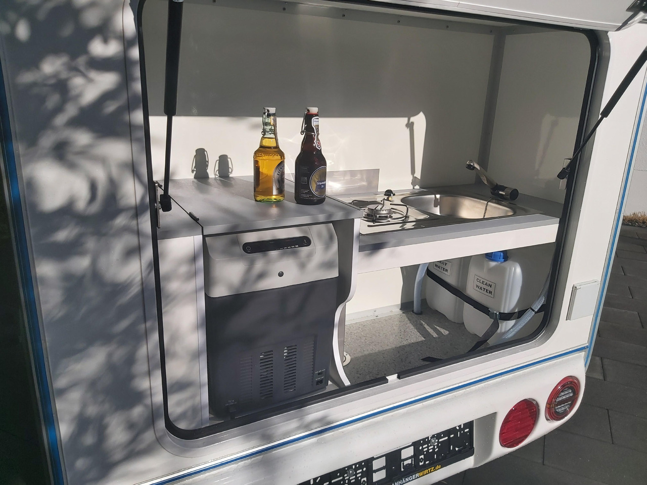 Dzīvojamais treileris Mini Camper Mini Tommy TMC25 252x140x121cm aero V1 Küche 12V/230V 100km/H 750kg gebremst Modell 24: foto 15
