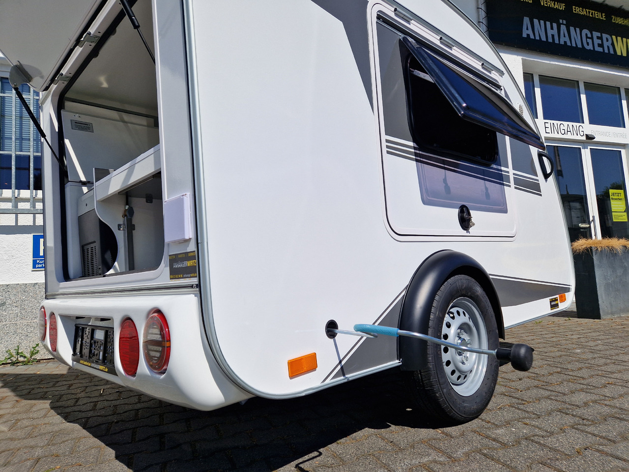 Dzīvojamais treileris Mini Camper Mini Tommy TMC25 252x140x121cm aero V1 Küche 12V/230V 100km/H 750kg gebremst Modell 24: foto 18