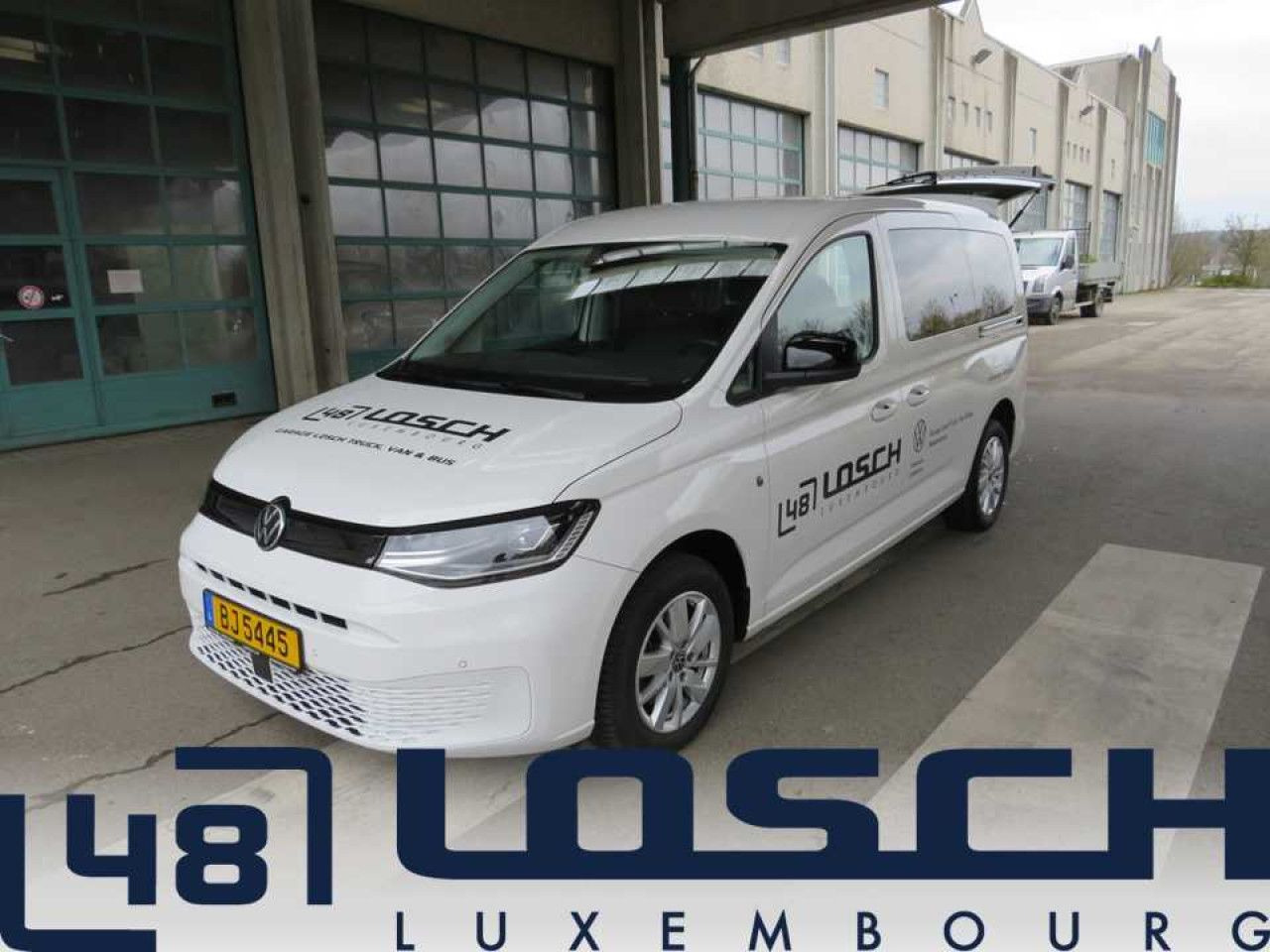 Vieglā automašīna Volkswagen Caddy Maxi Kombi Rollstuhlumbau Taxirampe Navi: foto 1