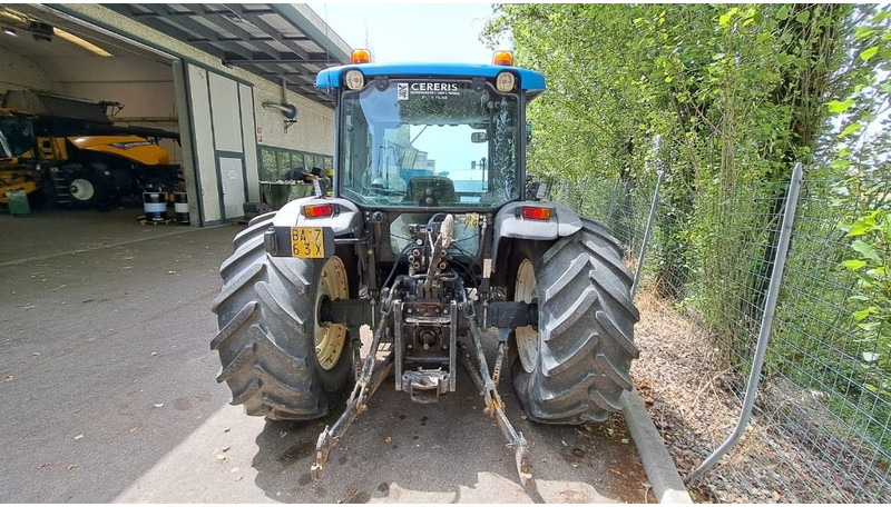 New Holland TN 95 D A - Traktors: foto 3 New Holland TN 95 D A - Traktors: foto 3