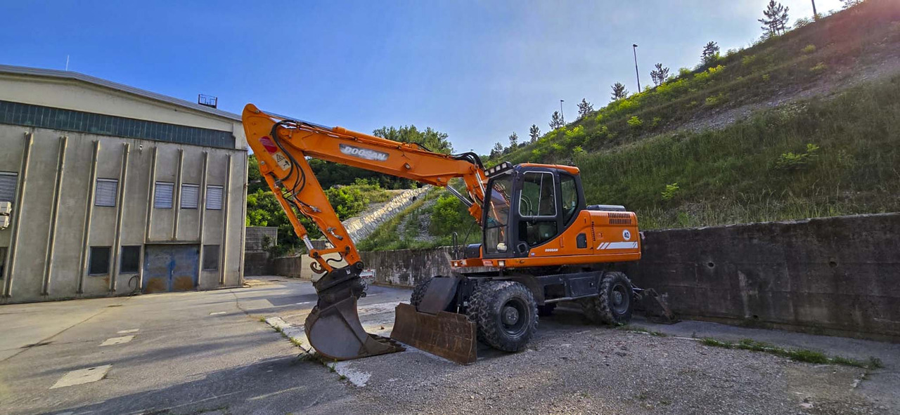 DOOSAN DX160W - Riteņu ekskavators: foto 1 DOOSAN DX160W - Riteņu ekskavators: foto 1