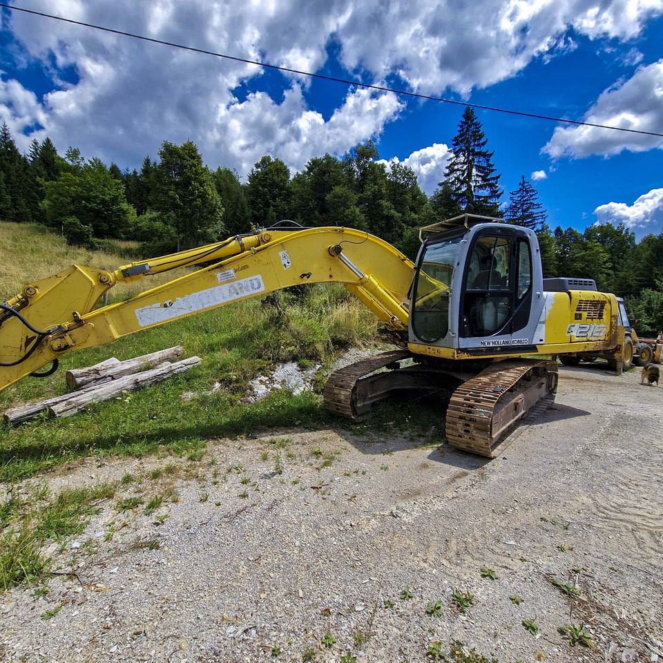 New Holland Kobelco E215 - Kāpurķēžu ekskavators: foto 2 New Holland Kobelco E215 - Kāpurķēžu ekskavators: foto 2