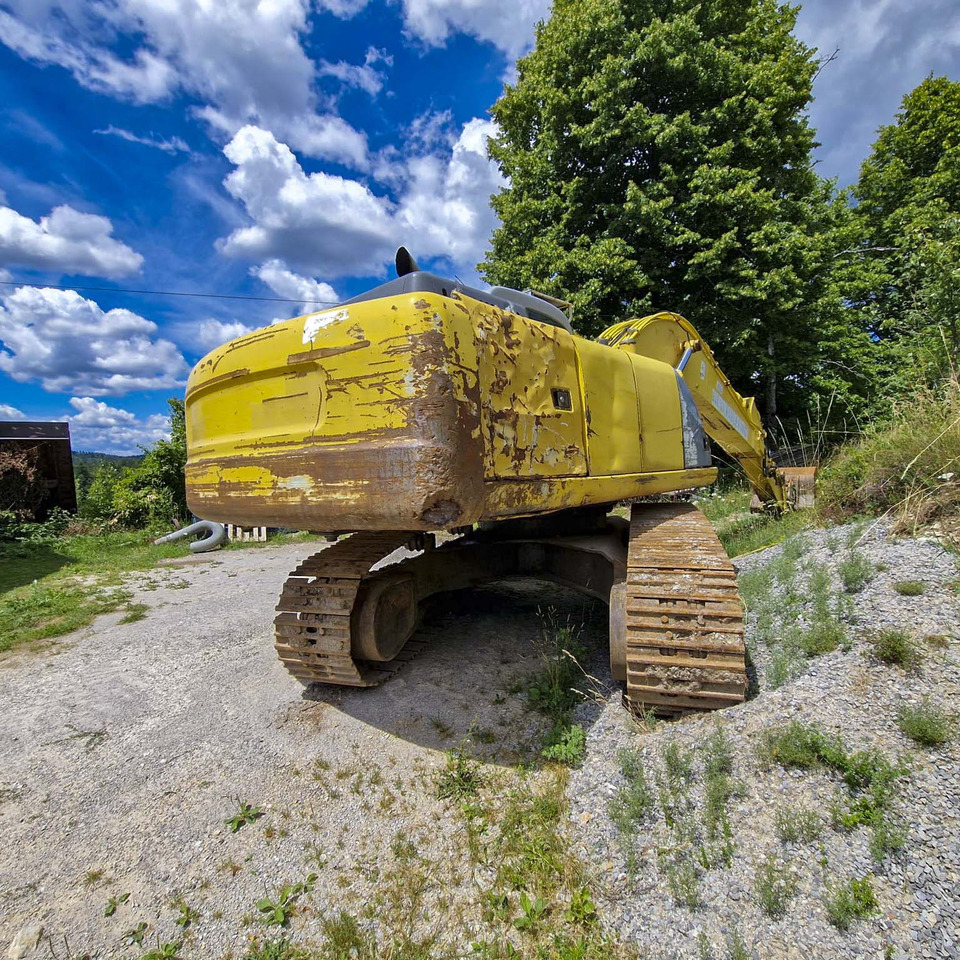 New Holland Kobelco E215 - Kāpurķēžu ekskavators: foto 5 New Holland Kobelco E215 - Kāpurķēžu ekskavators: foto 5