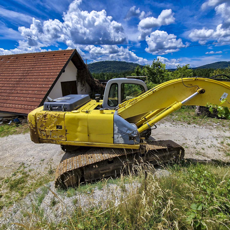 New Holland Kobelco E215 - Kāpurķēžu ekskavators: foto 4 New Holland Kobelco E215 - Kāpurķēžu ekskavators: foto 4