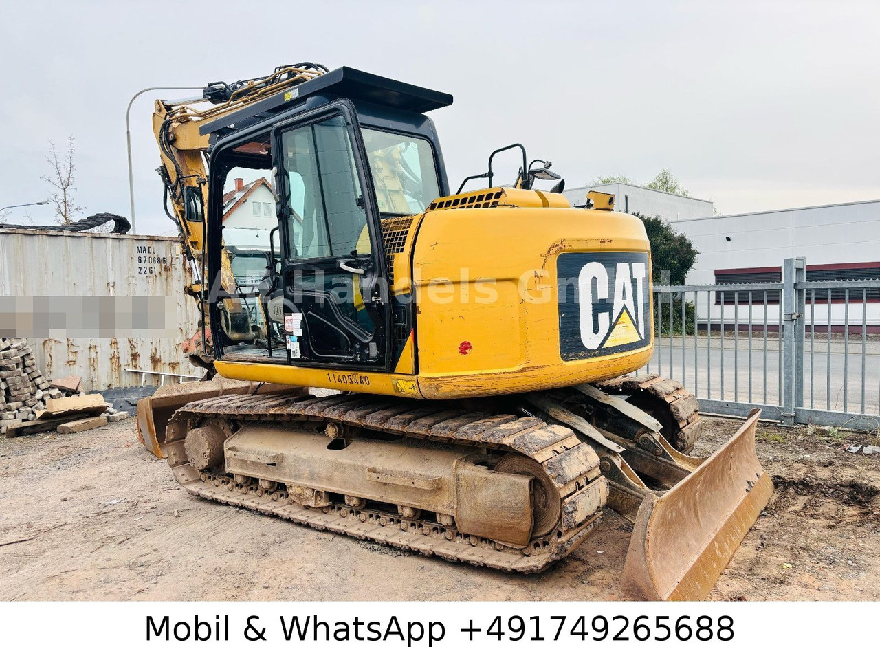 CAT 311D *6600Std./Schnellwechsler/Schaufel/Klima - Kāpurķēžu ekskavators: foto 5 CAT 311D *6600Std./Schnellwechsler/Schaufel/Klima - Kāpurķēžu ekskavators: foto 5