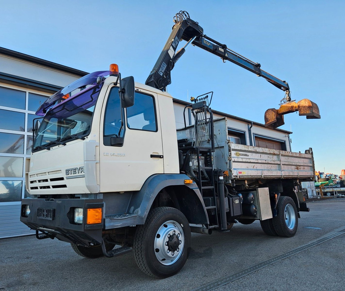 MAN LE 14.250 4x4 HIAB 077BS-2 Kran Greifer - Kravas automašīna pašizgāzējs, Kravas auto ar manipulatoru: foto 1 MAN LE 14.250 4x4 HIAB 077BS-2 Kran Greifer - Kravas automašīna pašizgāzējs, Kravas auto ar manipulatoru: foto 1
