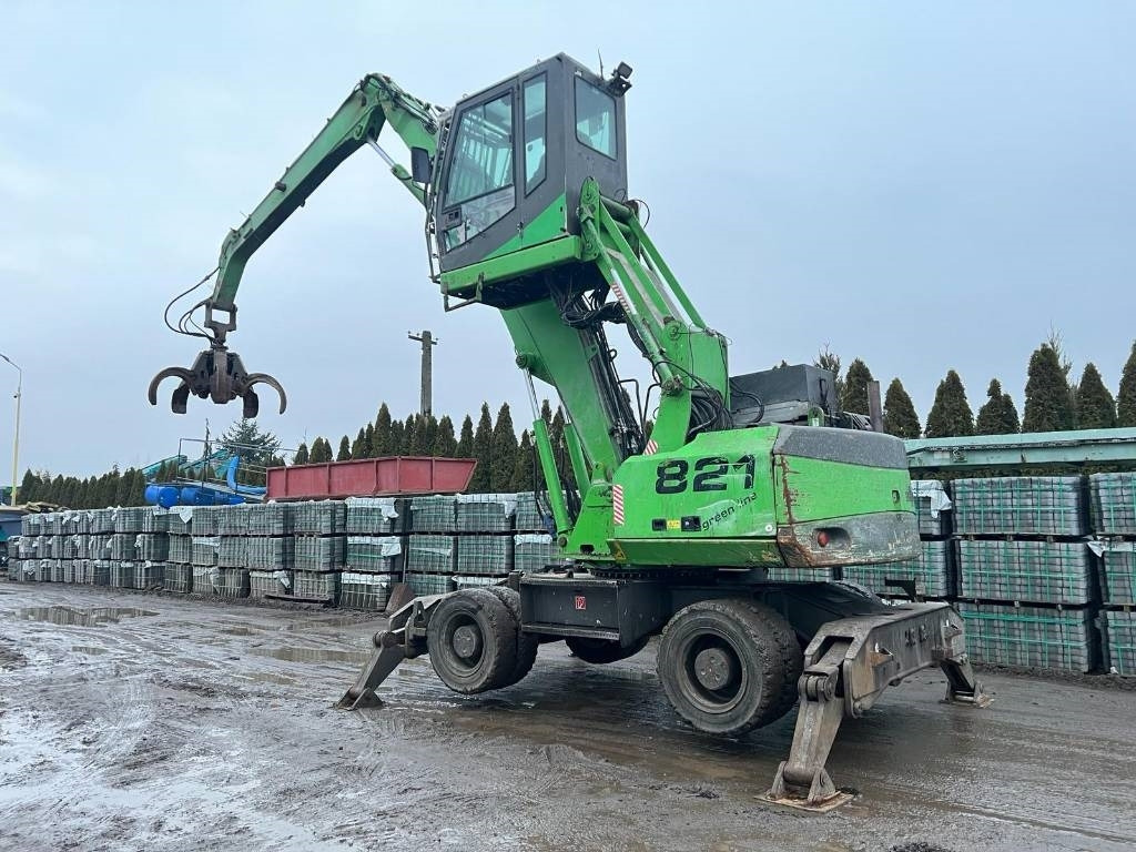 Sennebogen 821 - Atkritumu iekrāvējs: foto 4 Sennebogen 821 - Atkritumu iekrāvējs: foto 4