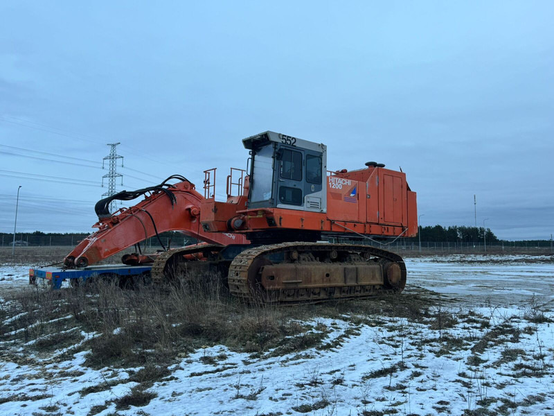 Hitachi EX1200-5D - Kāpurķēžu ekskavators: foto 1 Hitachi EX1200-5D - Kāpurķēžu ekskavators: foto 1