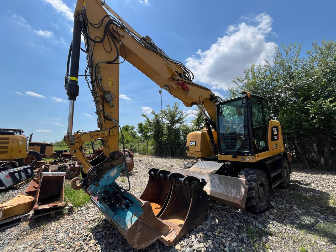 CAT M315F - Riteņu ekskavators: foto 1 CAT M315F - Riteņu ekskavators: foto 1