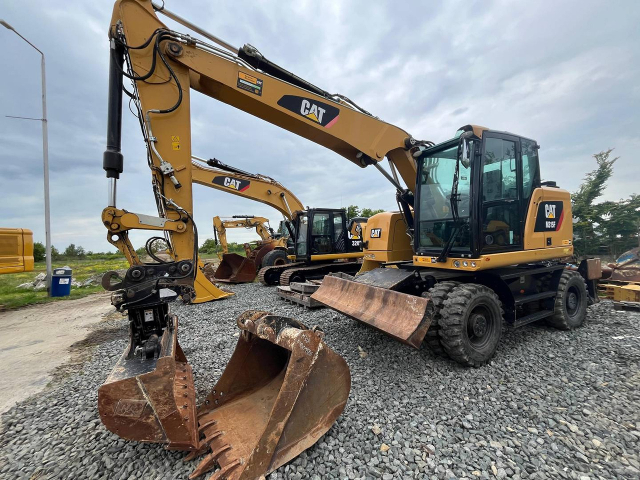 CAT M315F - Riteņu ekskavators: foto 1 CAT M315F - Riteņu ekskavators: foto 1