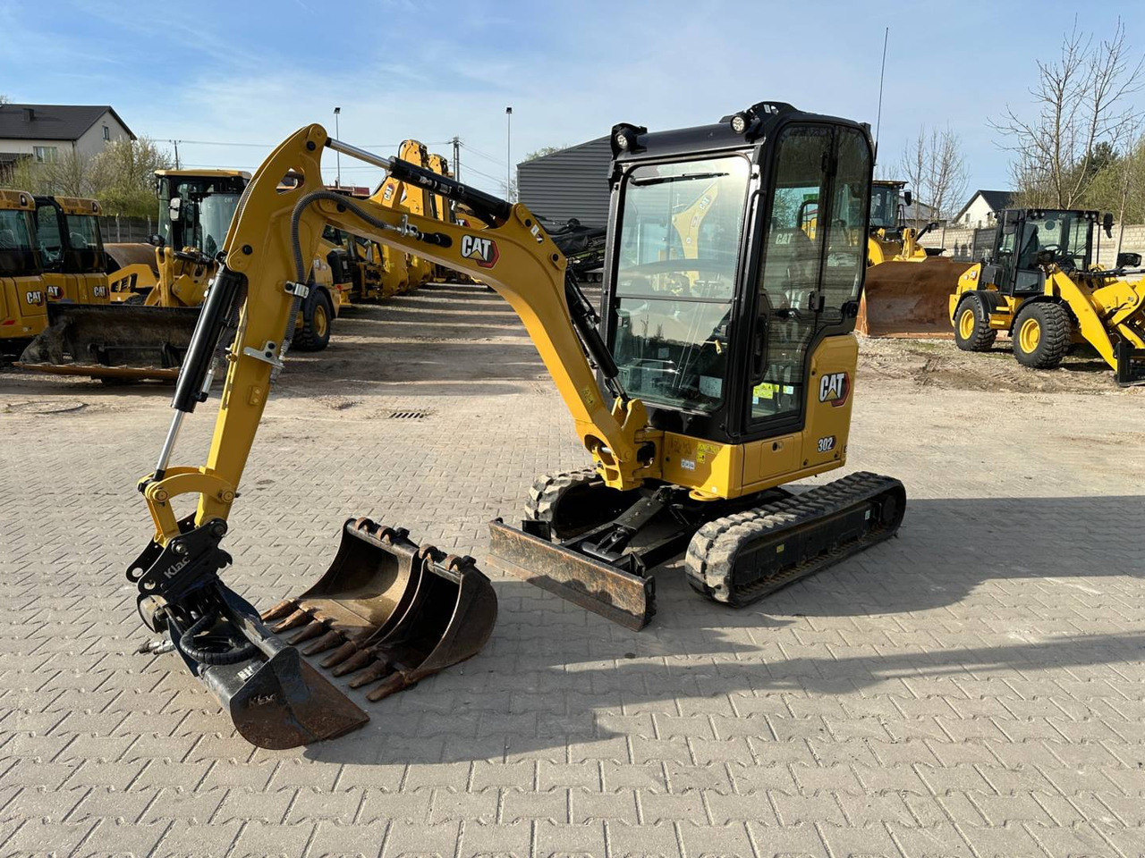 CAT 302CR - Kāpurķēžu ekskavators: foto 1 CAT 302CR - Kāpurķēžu ekskavators: foto 1
