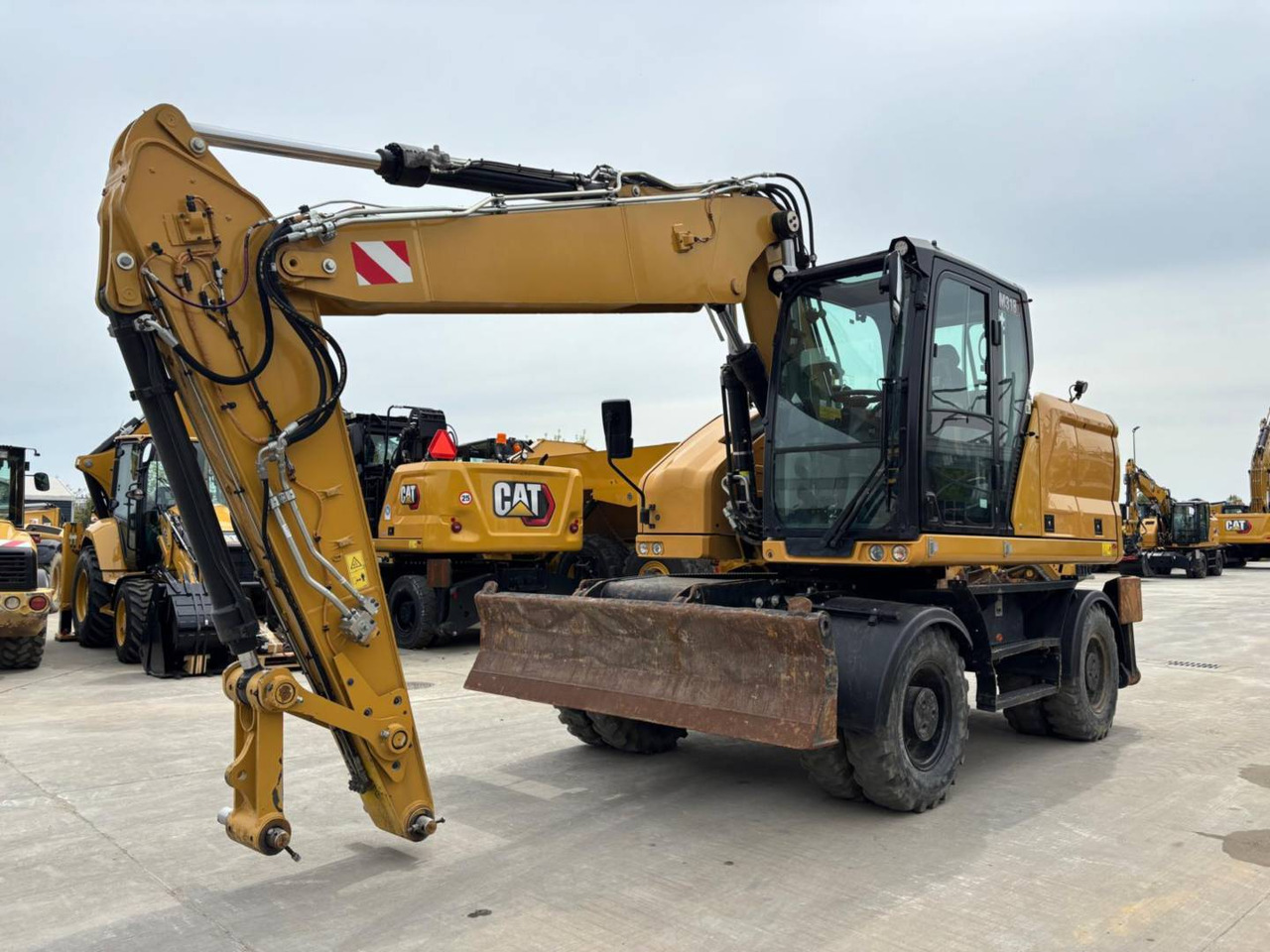 CAT M 318 - Riteņu ekskavators: foto 2 CAT M 318 - Riteņu ekskavators: foto 2