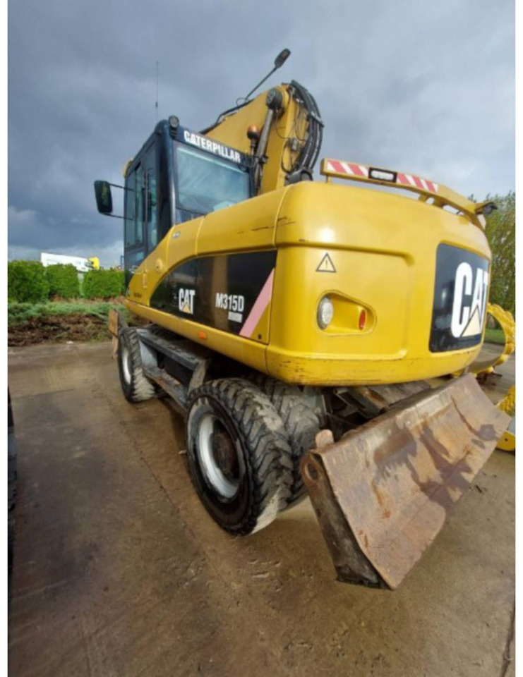 CAT M315D - Riteņu ekskavators: foto 4 CAT M315D - Riteņu ekskavators: foto 4