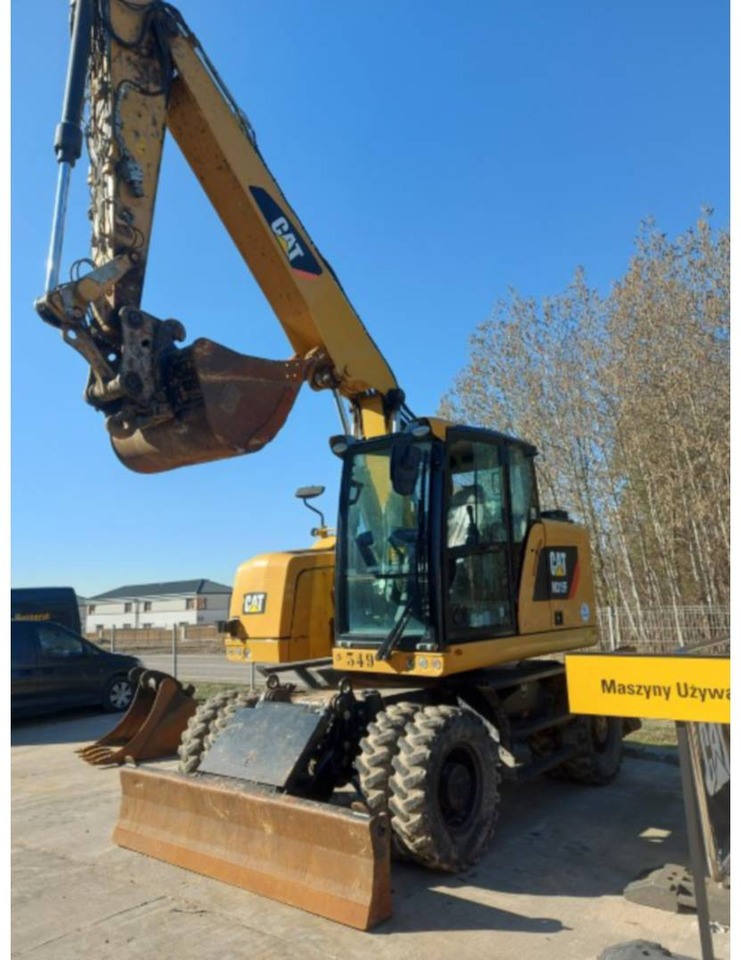 CAT M315F - Riteņu ekskavators: foto 1 CAT M315F - Riteņu ekskavators: foto 1