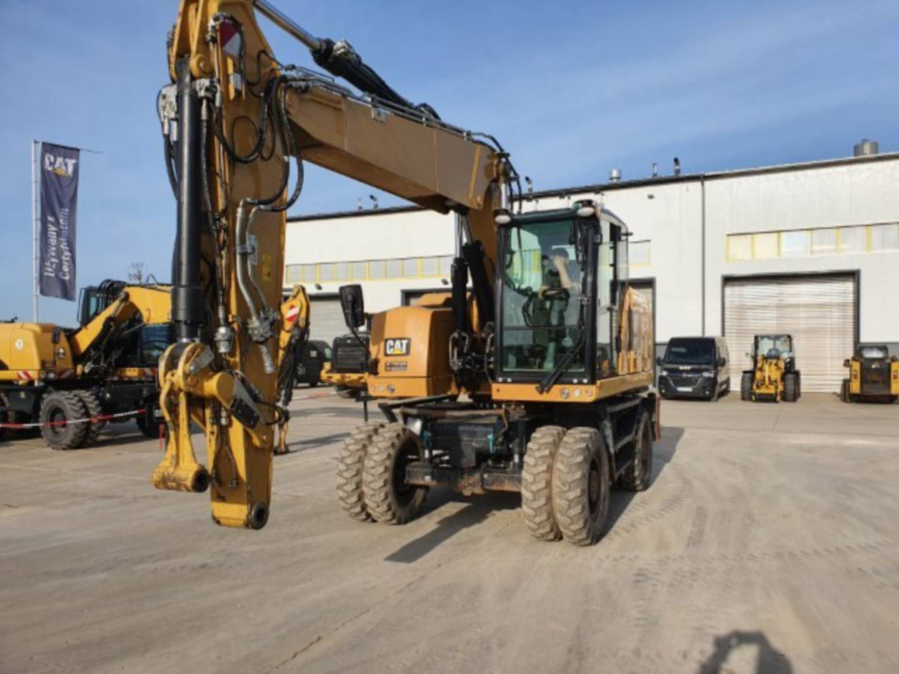 CAT M318F - Riteņu ekskavators: foto 1 CAT M318F - Riteņu ekskavators: foto 1