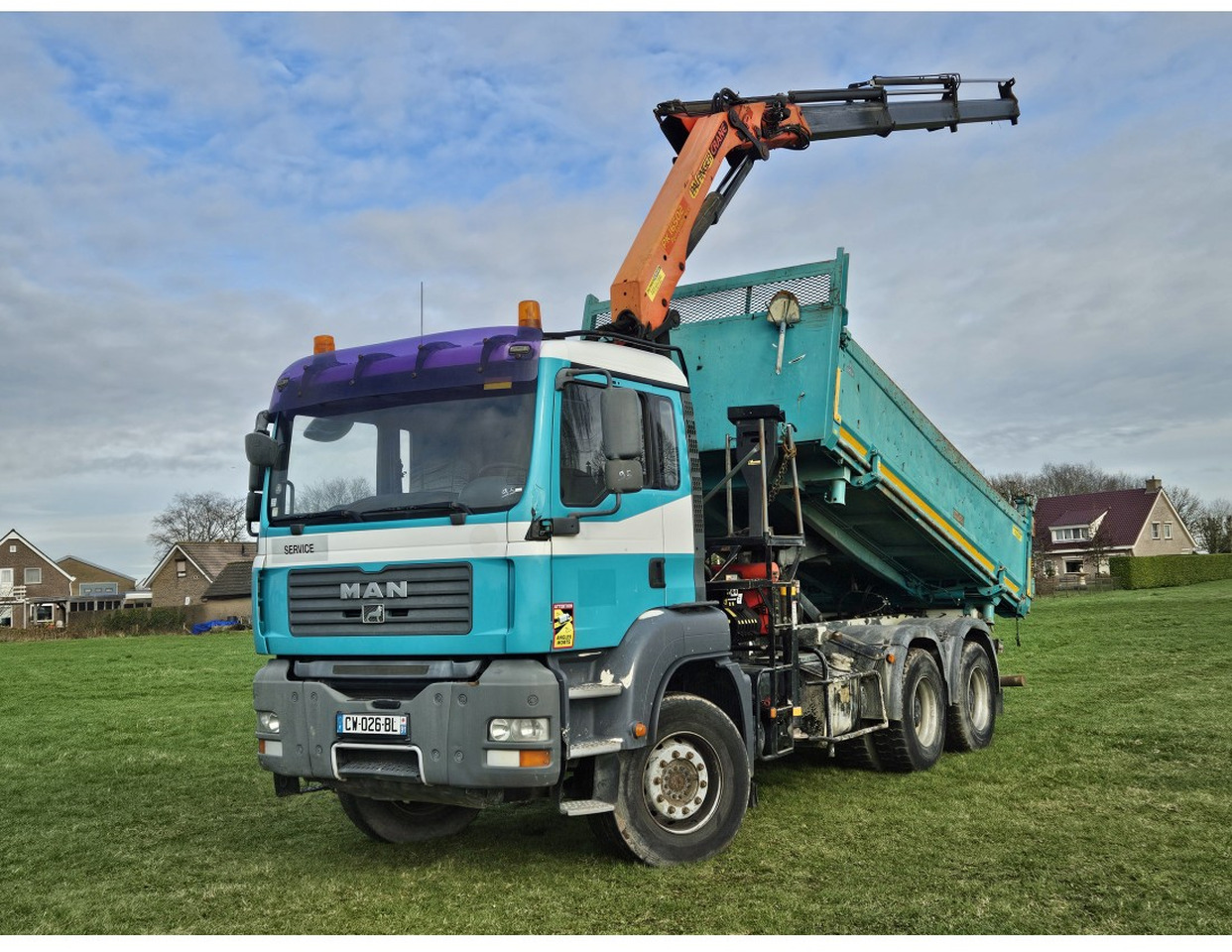 MAN TGA 33.360 TIPPER 3 SIDE CRANE PALFINGER 16502 *REMOTE CONTROL - Kravas automašīna pašizgāzējs: foto 1 MAN TGA 33.360 TIPPER 3 SIDE CRANE PALFINGER 16502 *REMOTE CONTROL - Kravas automašīna pašizgāzējs: foto 1