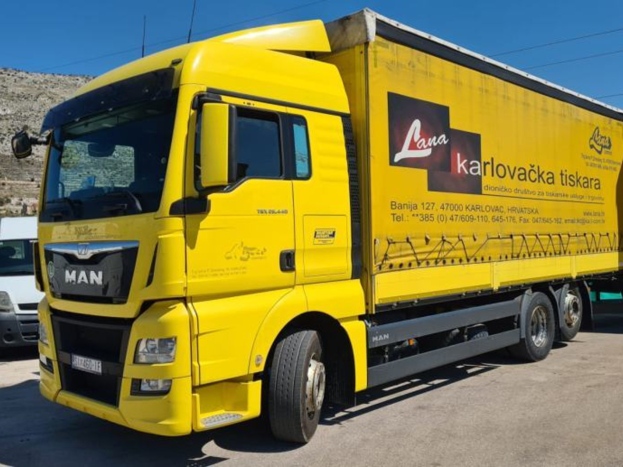MAN TGX 26.440 - Kravas automašīna ar tentu: foto 1 MAN TGX 26.440 - Kravas automašīna ar tentu: foto 1