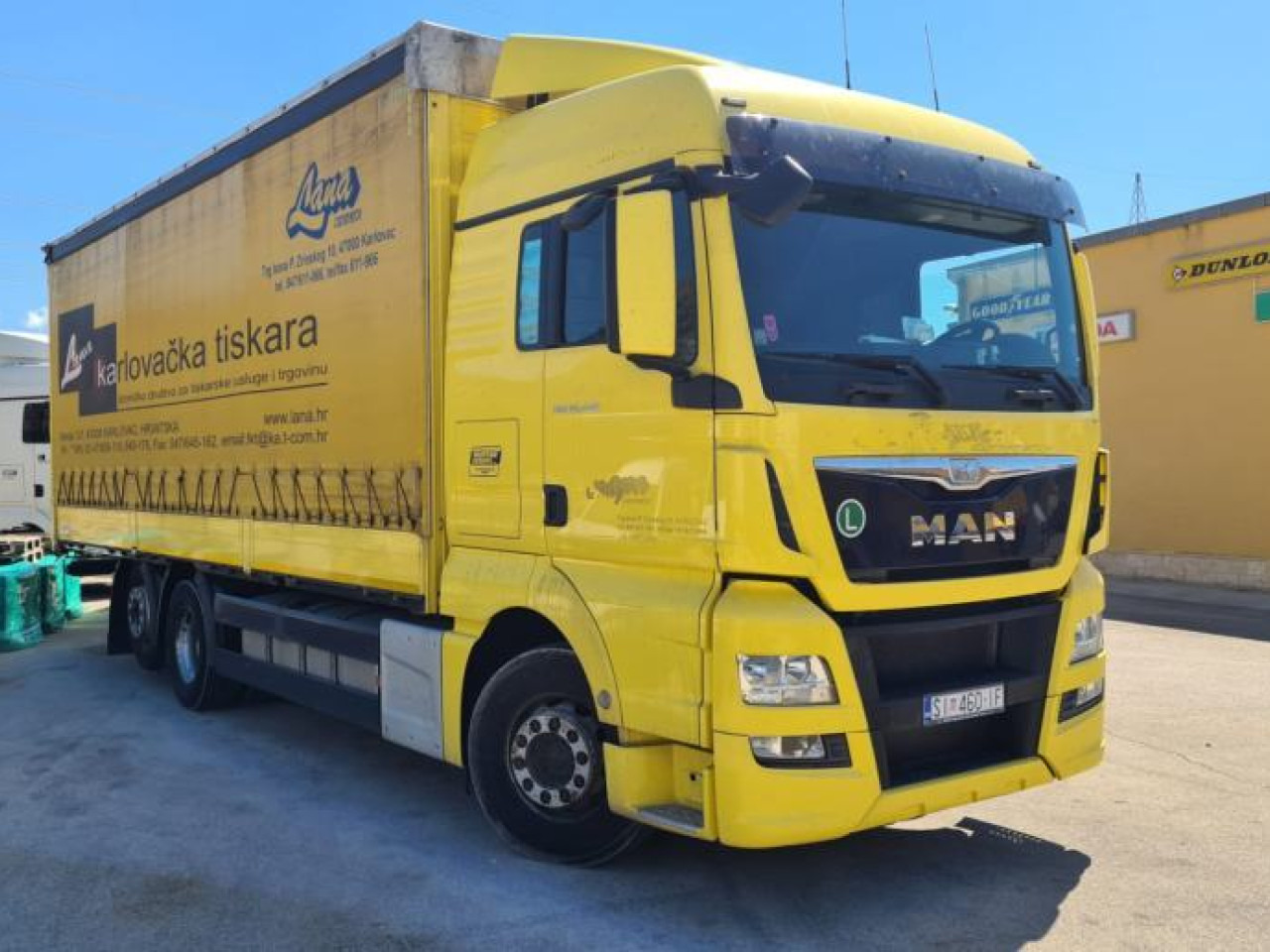 MAN TGX 26.440 - Kravas automašīna ar tentu: foto 2 MAN TGX 26.440 - Kravas automašīna ar tentu: foto 2